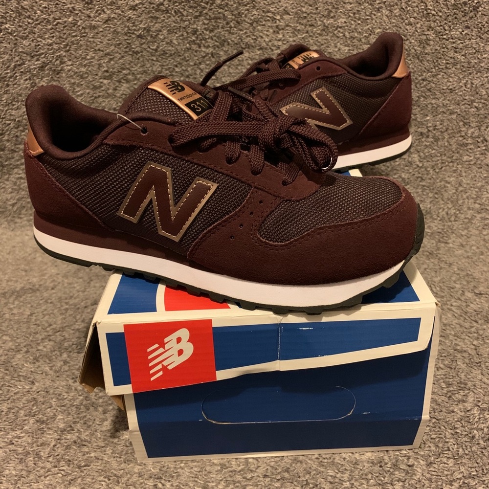 New Balance 311